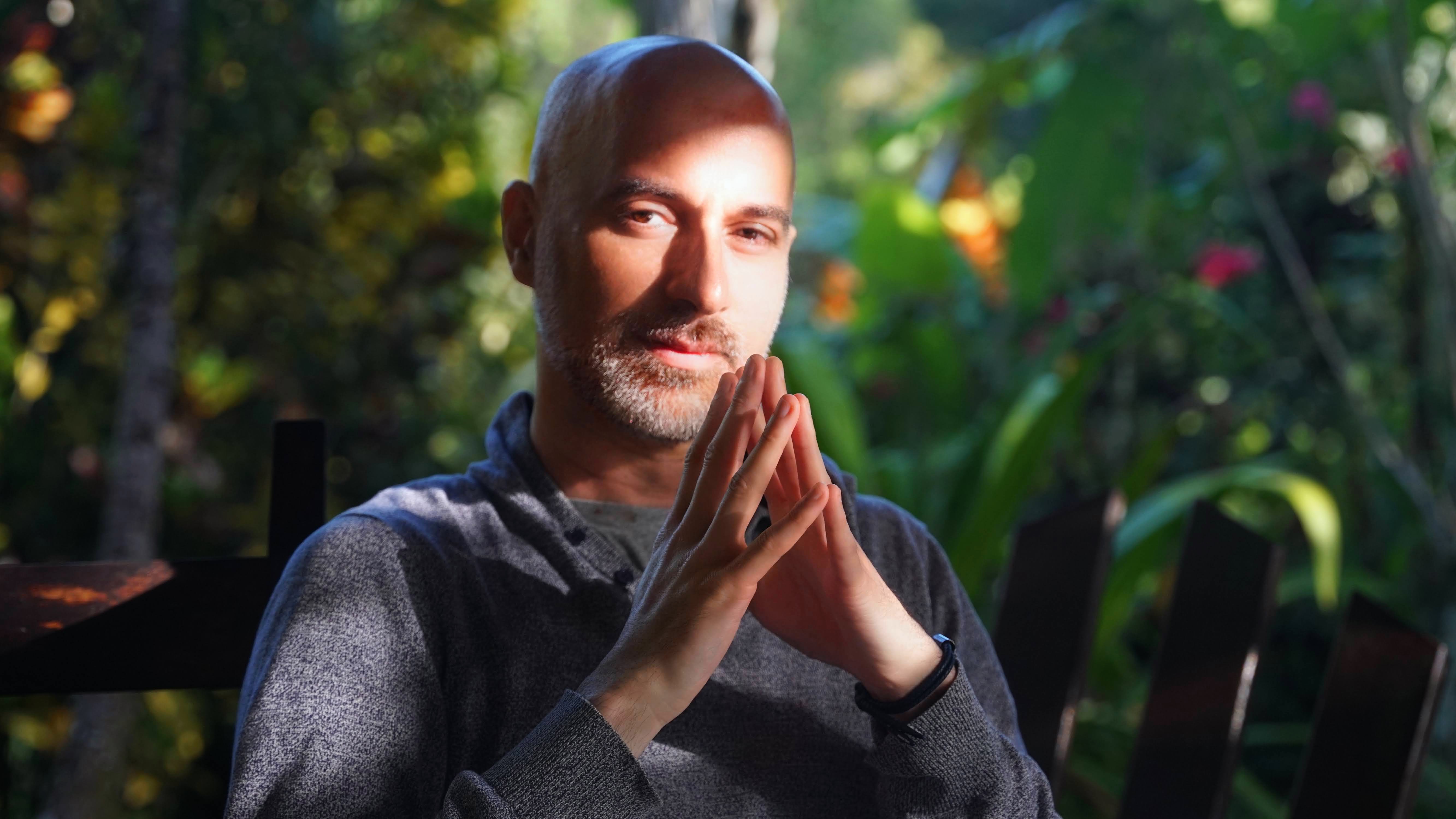 A portrait of Avi in the garden